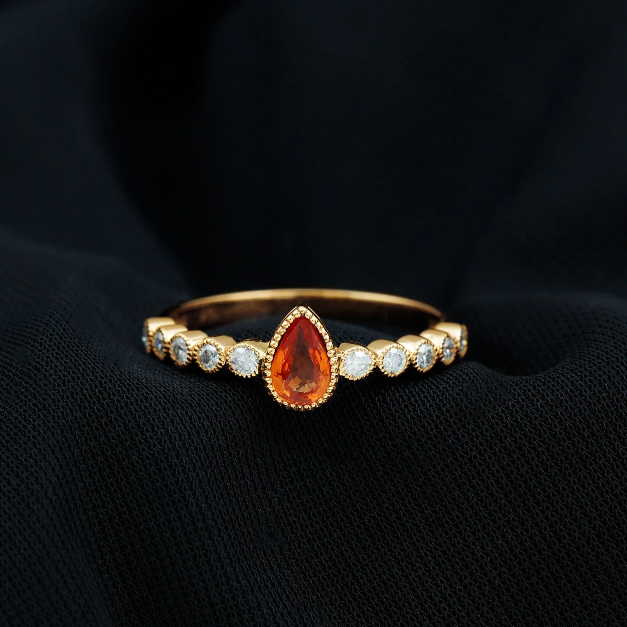 Beaded Bezel Set Pear Cut Orange Sapphire Ring with Diamond