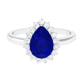 Created Blue Sapphire and Diamond Halo Teardrop Ring