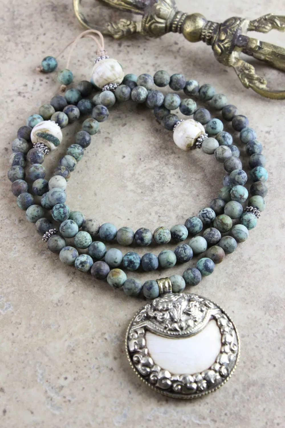 Encouraging African Turquoise Mala with Naga Shell Pendant