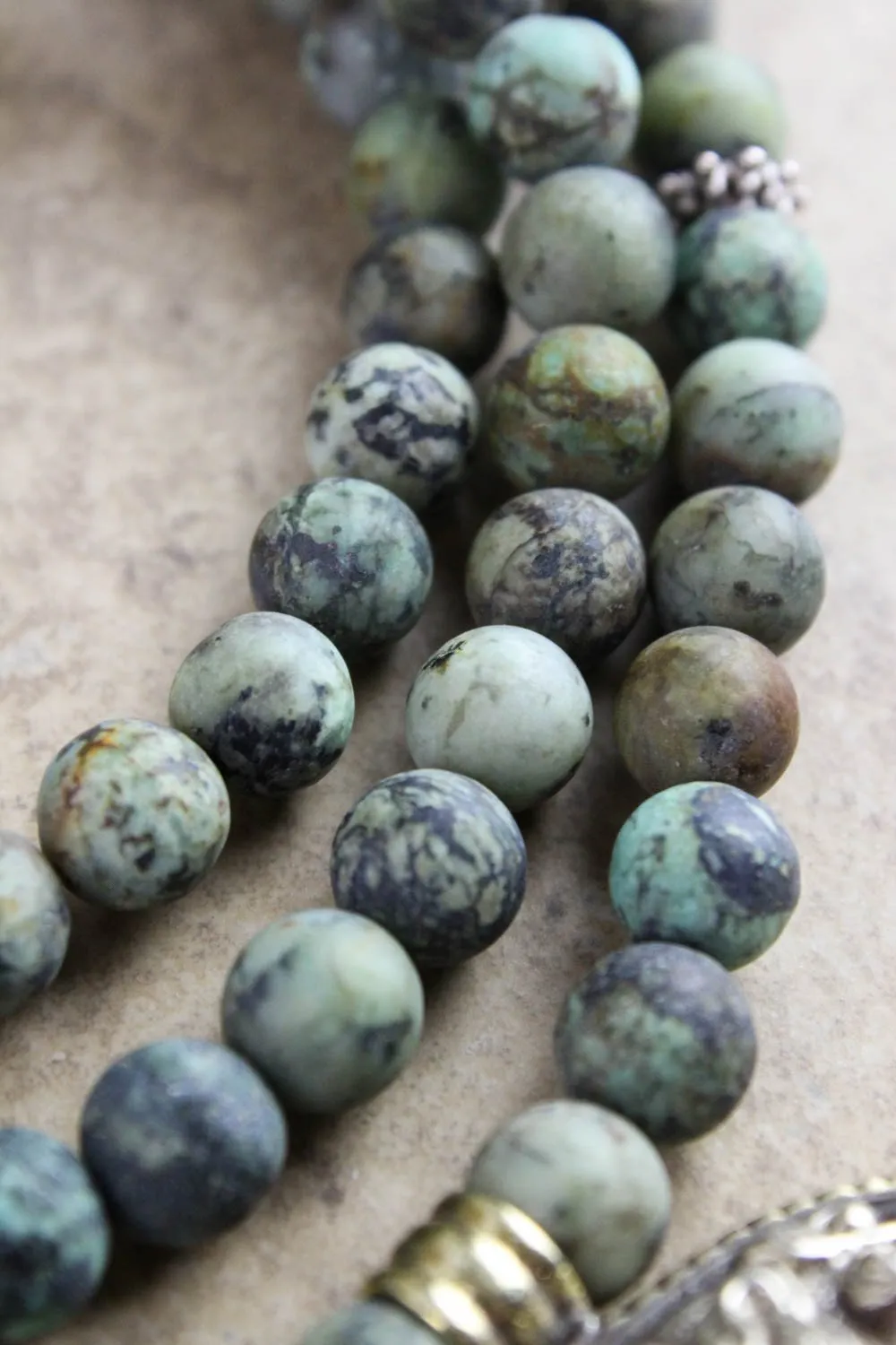 Encouraging African Turquoise Mala with Naga Shell Pendant