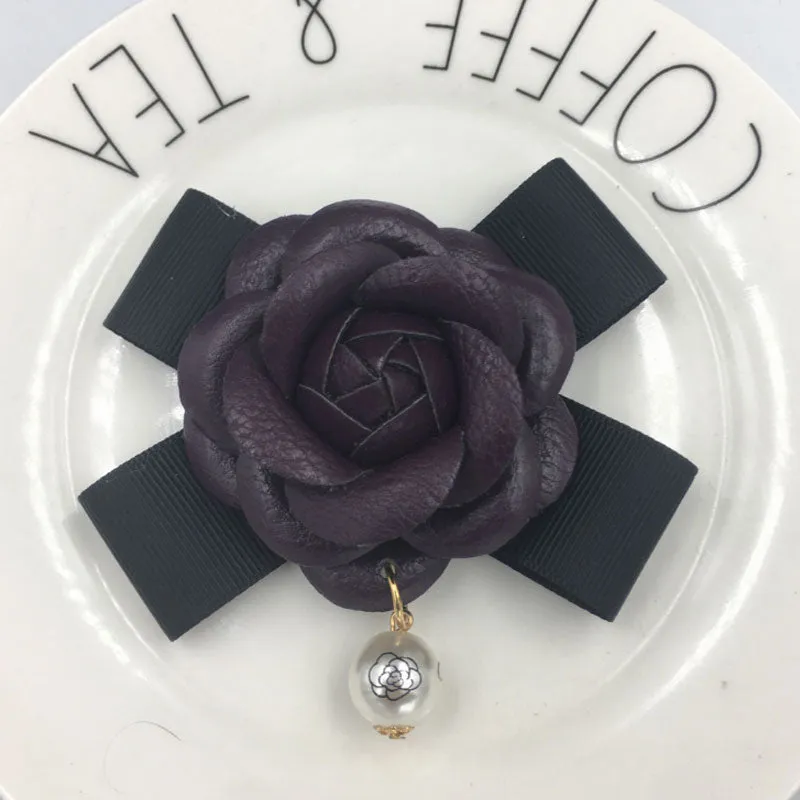 Famous Luxury Leather Brooches