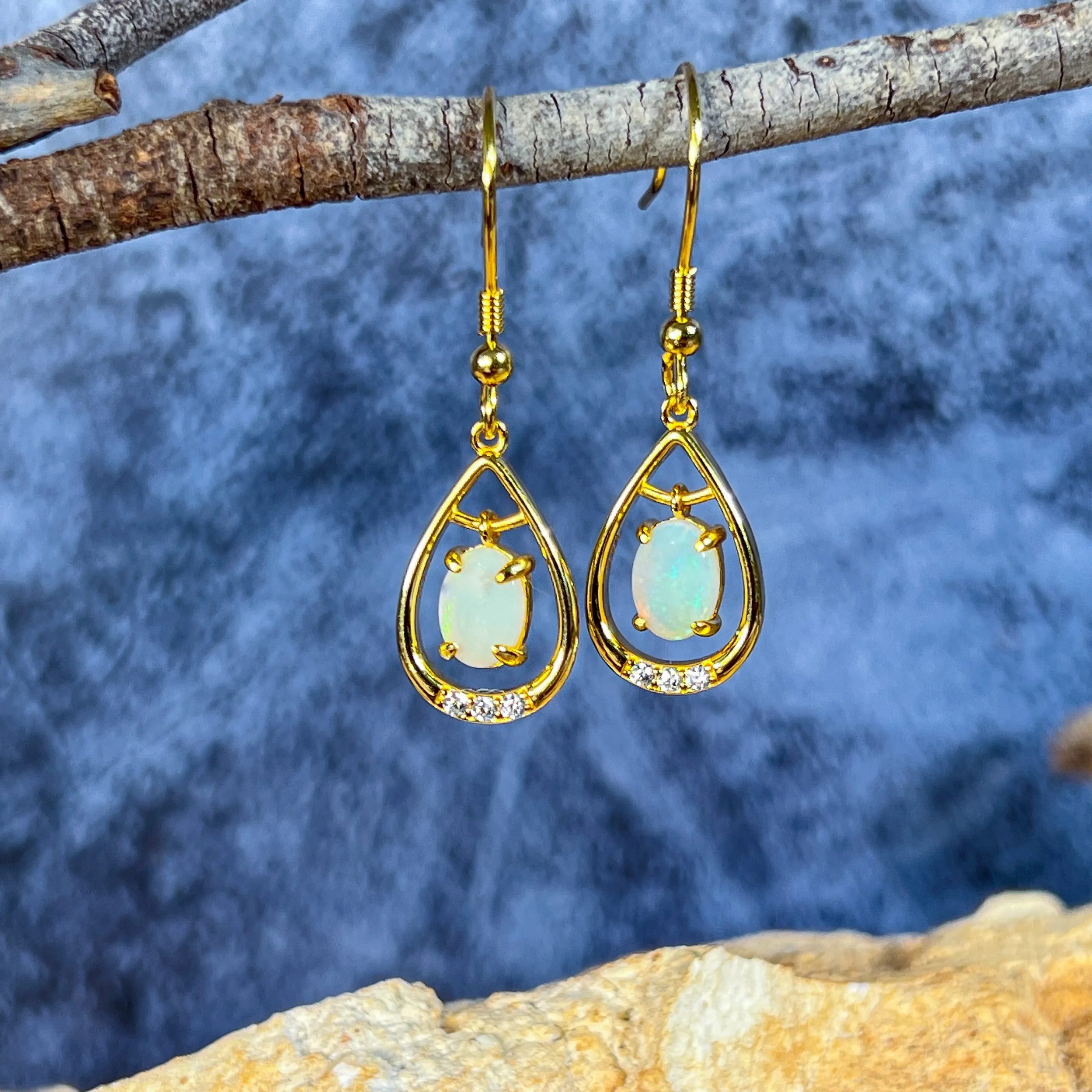 Gold Plated silver dangling pearshape frame dangling 7x5mm Opal earrings