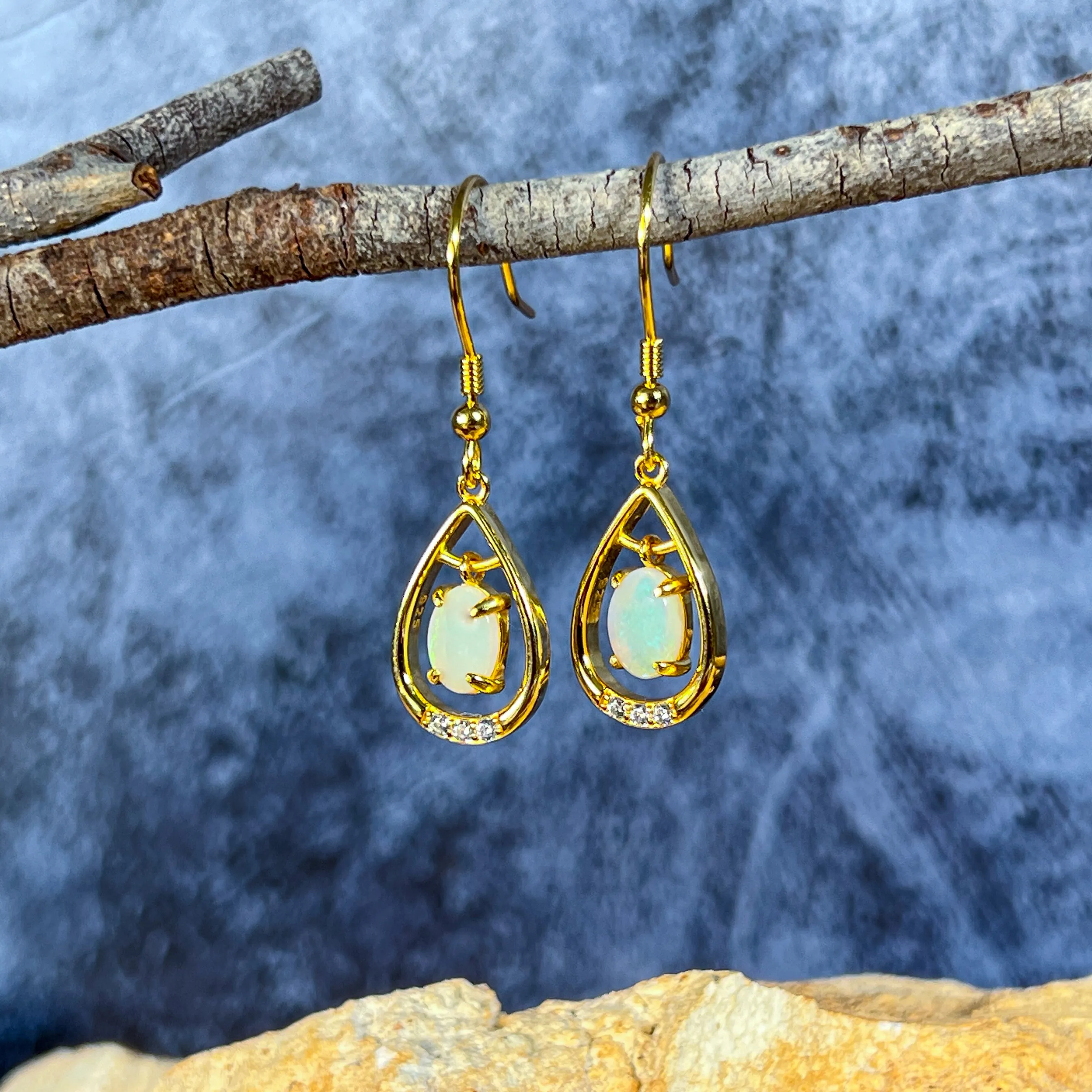 Gold Plated silver dangling pearshape frame dangling 7x5mm Opal earrings