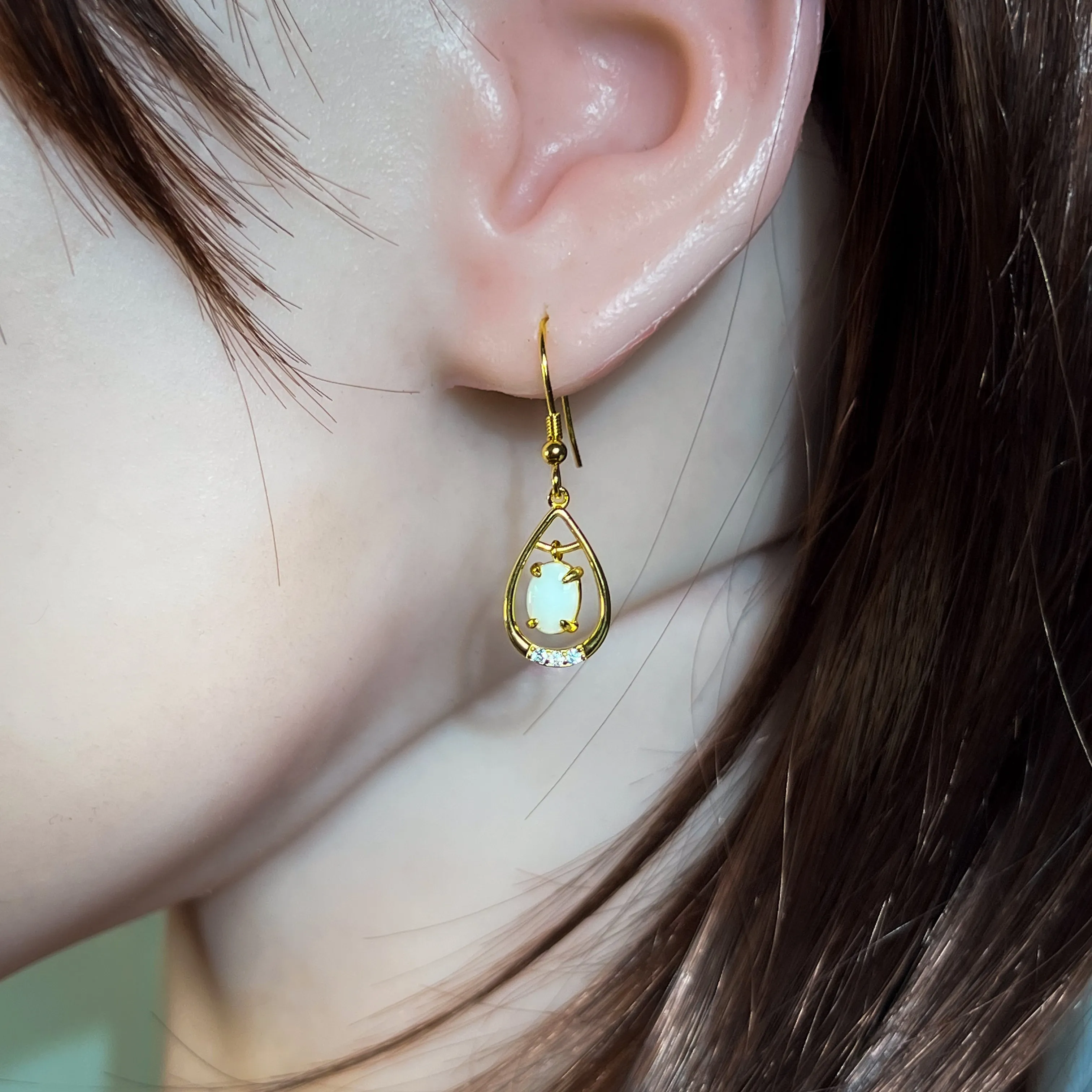 Gold Plated silver dangling pearshape frame dangling 7x5mm Opal earrings