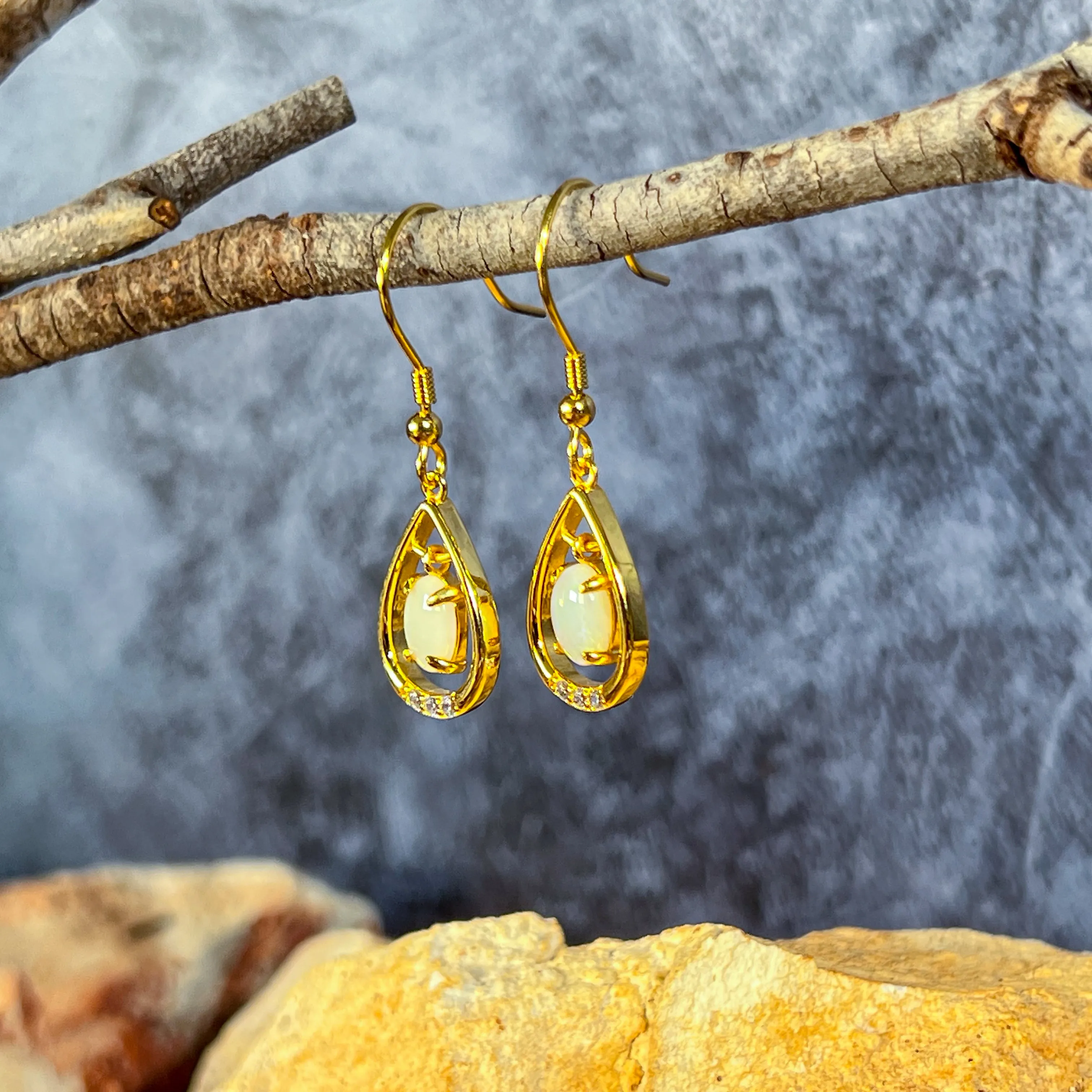 Gold Plated silver dangling pearshape frame dangling 7x5mm Opal earrings