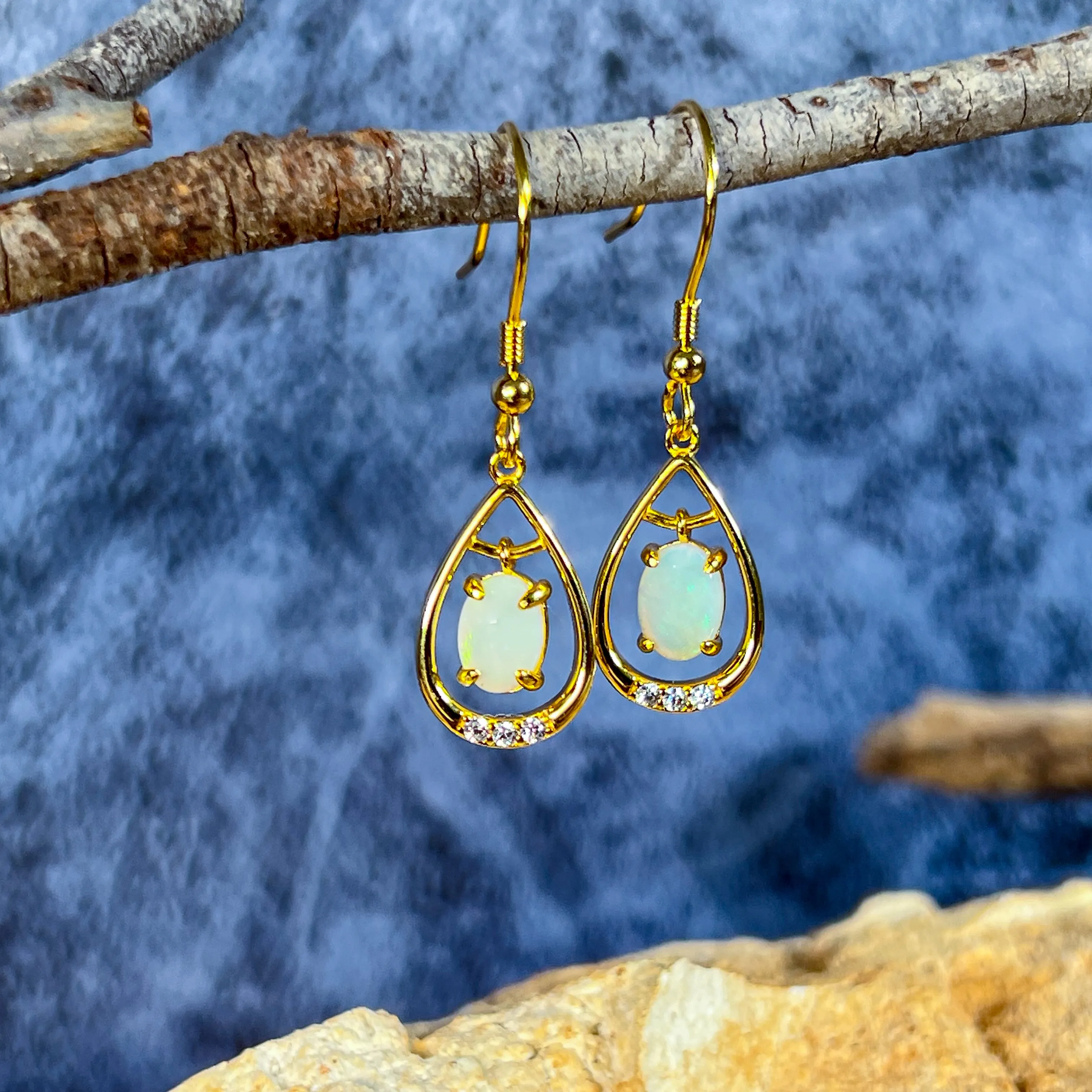 Gold Plated silver dangling pearshape frame dangling 7x5mm Opal earrings