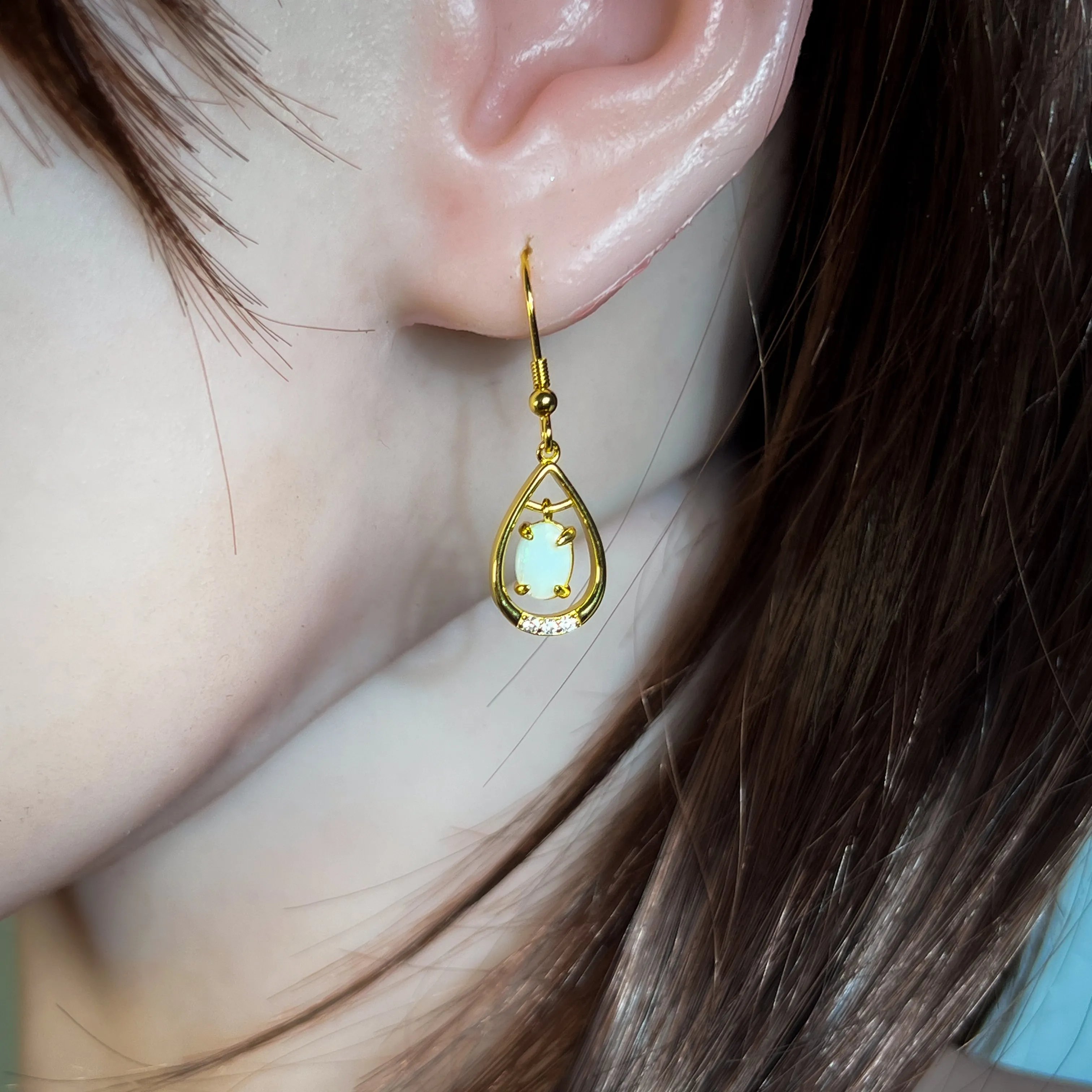 Gold Plated silver dangling pearshape frame dangling 7x5mm Opal earrings
