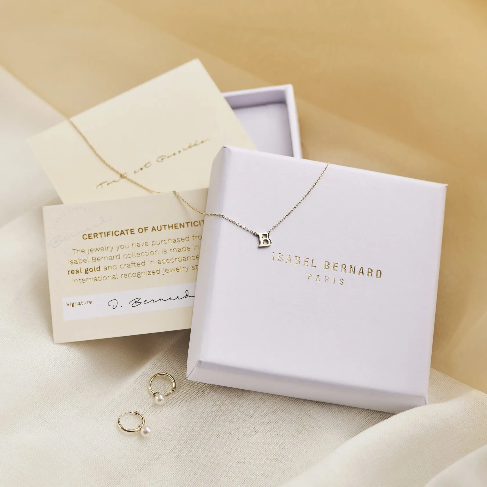Saint Germain Nadie 14 karat white gold ear studs with sphere